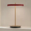UMAGE Asteria Move LED-Tischleuchte, Rubinrot